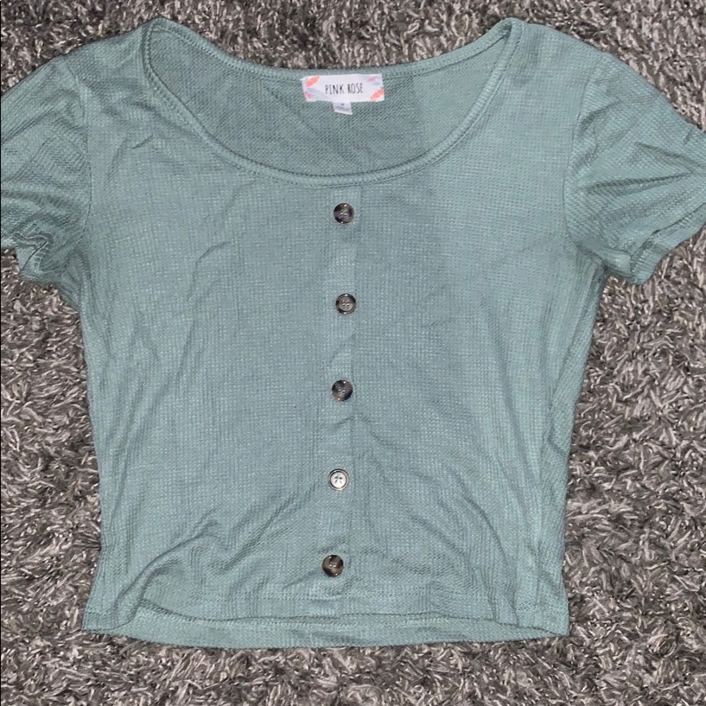 Green button down shirt